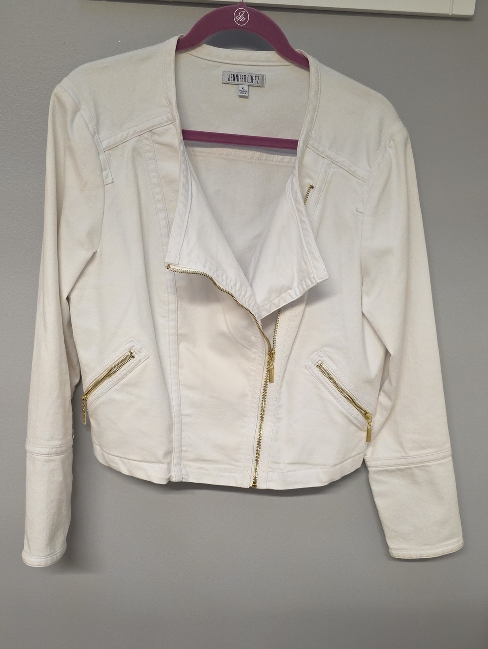 Jennifer Lopez White Denim Motorcycle Jacket with Gold Zipper Accents